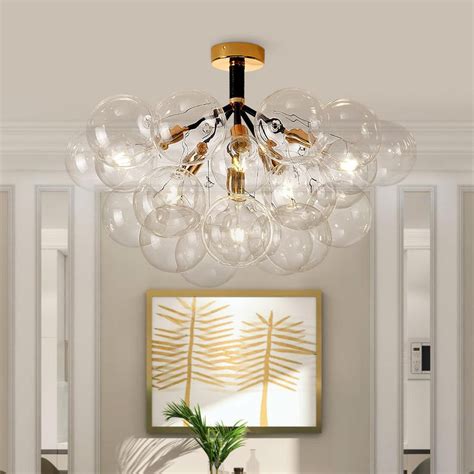 Easy to install, this chandelier goes well with any decor and is ready to add light and charm to your space. . Bubble cluster chandelier